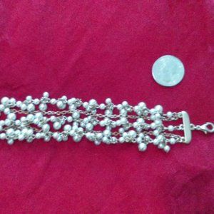 Gold tone and "pearl" bead bracelet 7" approx.